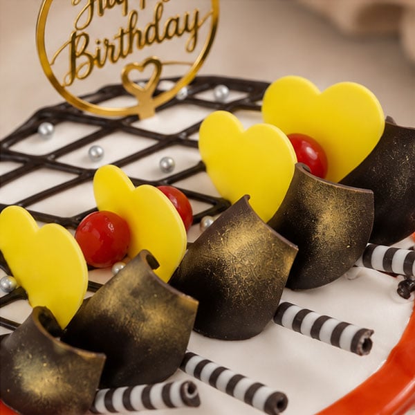 Premium Butterscotch Birthday Cake with Chocolate & Heart Decorations 4